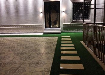 شاليه بألعاب مائية وجلسة خارجية