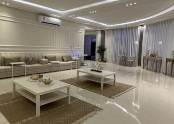 شاليه بمسطح اخضر وجلسة خارجية 