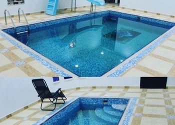 شاليه بمسطح اخضر وجلسة خارجية 