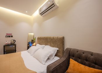 استديو أنيق بسرير ماستر وجلسة جانبية 