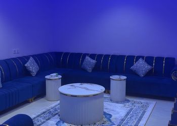 شاليه بمسطح اخضر وجلسة خارجية 