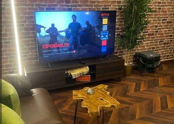 استديو بسرير مفرد وجلسة 