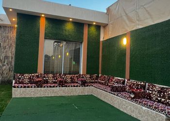 شاليه بجلسة خارجية وألعاب أطفال