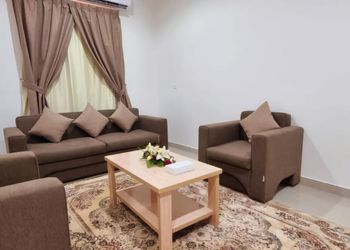 شقة بغرفة معيشة وغرفة نوم