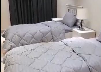 شقة بغرفتين نوم وغرفة جلوس 