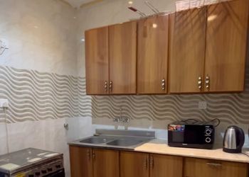 استراحة بمسبح خارجي وجلسة خارجية