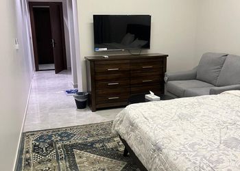 استديو أنيق بسرير ماستر وجلسة جانبية 