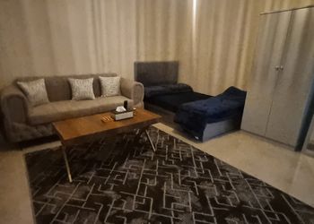 استديو بسرير ماستر وجلسة مريحة 