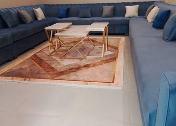 شاليه بمسطح اخضر وجلسة خارجية