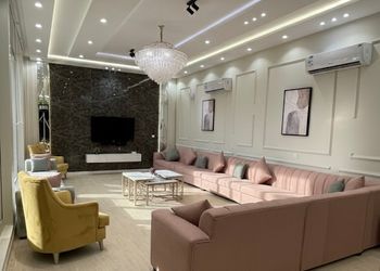 شاليه بمسطح اخضر وجلسة خارجية 