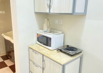 استديو بسرير ماستر وجلسة مريحة 