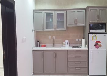شاليه بألعاب أطفال ,موقد حطب,مسطح اخضر,