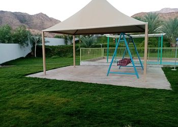 استراحة بإطلالة جبلية ومسطح أخضر