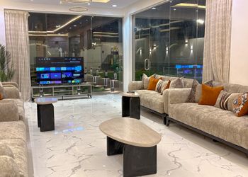 شاليه بمسطح اخضر ومسبح ألعاب مائية