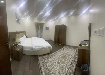 شقة بغرفة معيشة وغرفة نوم 