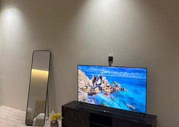 استديو بسرير ماستر وجلسة مريحة 