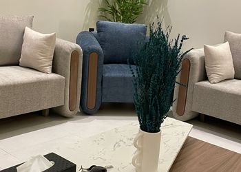 شاليه بمسطح اخضر وجلسة خارجية 