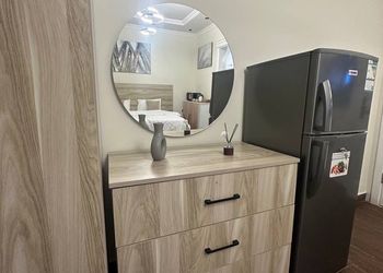 استديو بسرير ماستر وجلسة جانبية