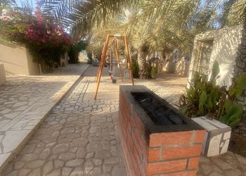 استراحة بمسبح وجلسة خارجية 