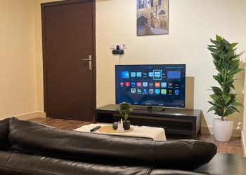 استديو بسرير فردي وجلسة جانبية