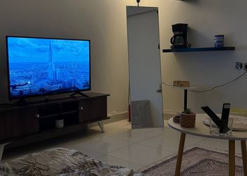 استديو بسرير وجلسة جانبية