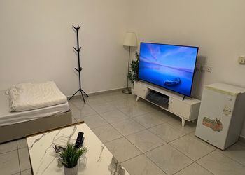 استديو بسرير فردي وجلسة جانبية