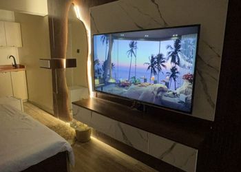 استديو أنيق بسرير ماستر وجلسة جانبية 