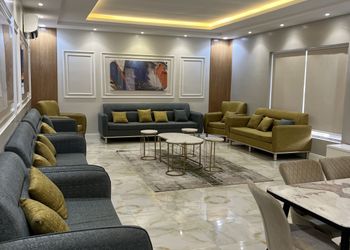 شاليه بمسطح اخضر وجلسة خارجية 