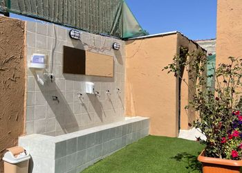 استراحة بمسطح اخضر و جلسة خارجية