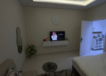 استديو بسرير مريح وجلسة جانبية 