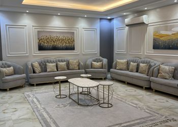 شاليه بمسطح اخضر وجلسة خارجية 