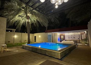 شاليه بمسطحات خضراء 