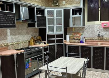 استراحة بجلسة خارجية ومسطح اخضر