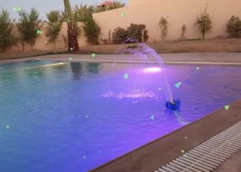 استراحة بمسطح اخضر وجلسه خارجيه