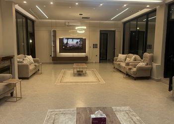 شاليه بمسطح اخضر وجلسة خارجية 
