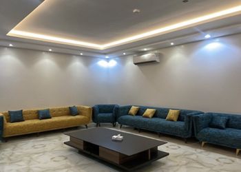 شاليه بمسطح اخضر وجلسة خارجية 