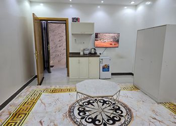 استديو بسريرين مفردة و أثاث مريح