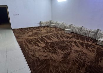 استراحة بمسطح اخضر ومجالس