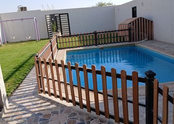 شاليه بمسطح اخضر و مسبح