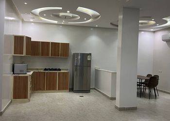 شاليه بمسطح اخضر وجلسة خارجية 