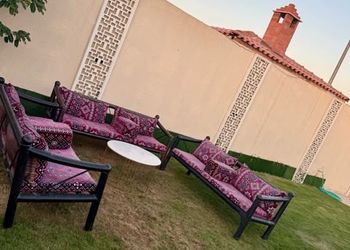 شاليه بألعاب أطفال وجلسة خارجية 
