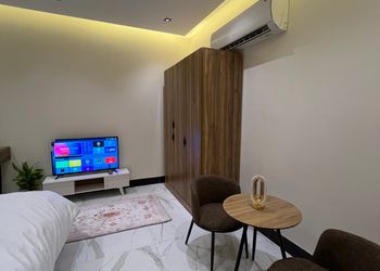غرفة نوم بمطبخ