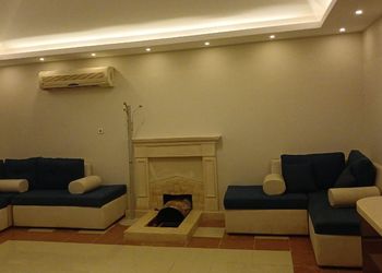 استراحة بجلسة خارجية ومسطح اخضر