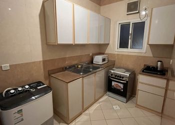 شقة بغرفة وصالة دخول ذاتي 