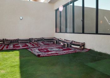 شاليه بألعاب أطفال وجلسة خارجية 