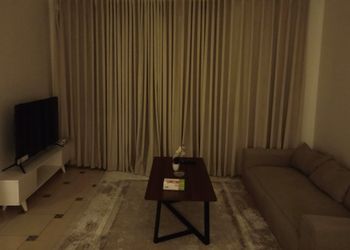 استديو بسرير فردي وجلسة جانبية